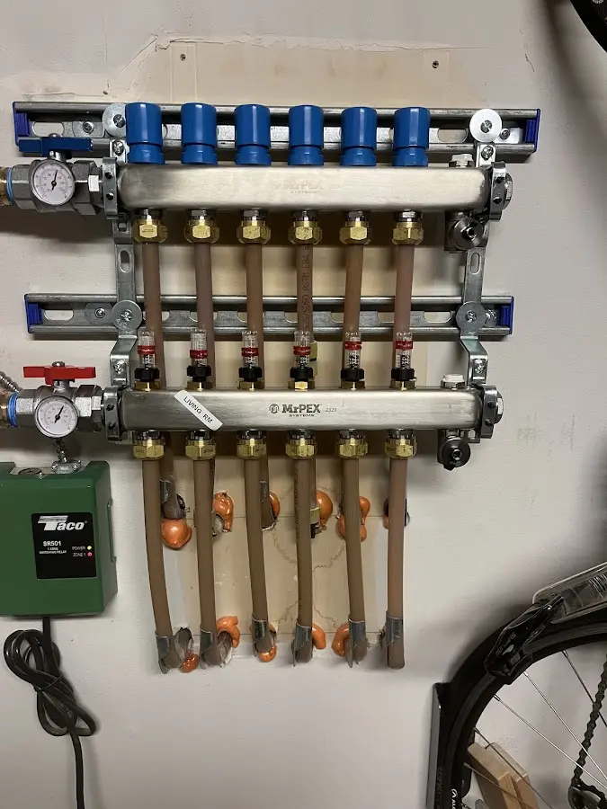 Plumber performing Water Heater Repair at a residential property in North Terre Haute